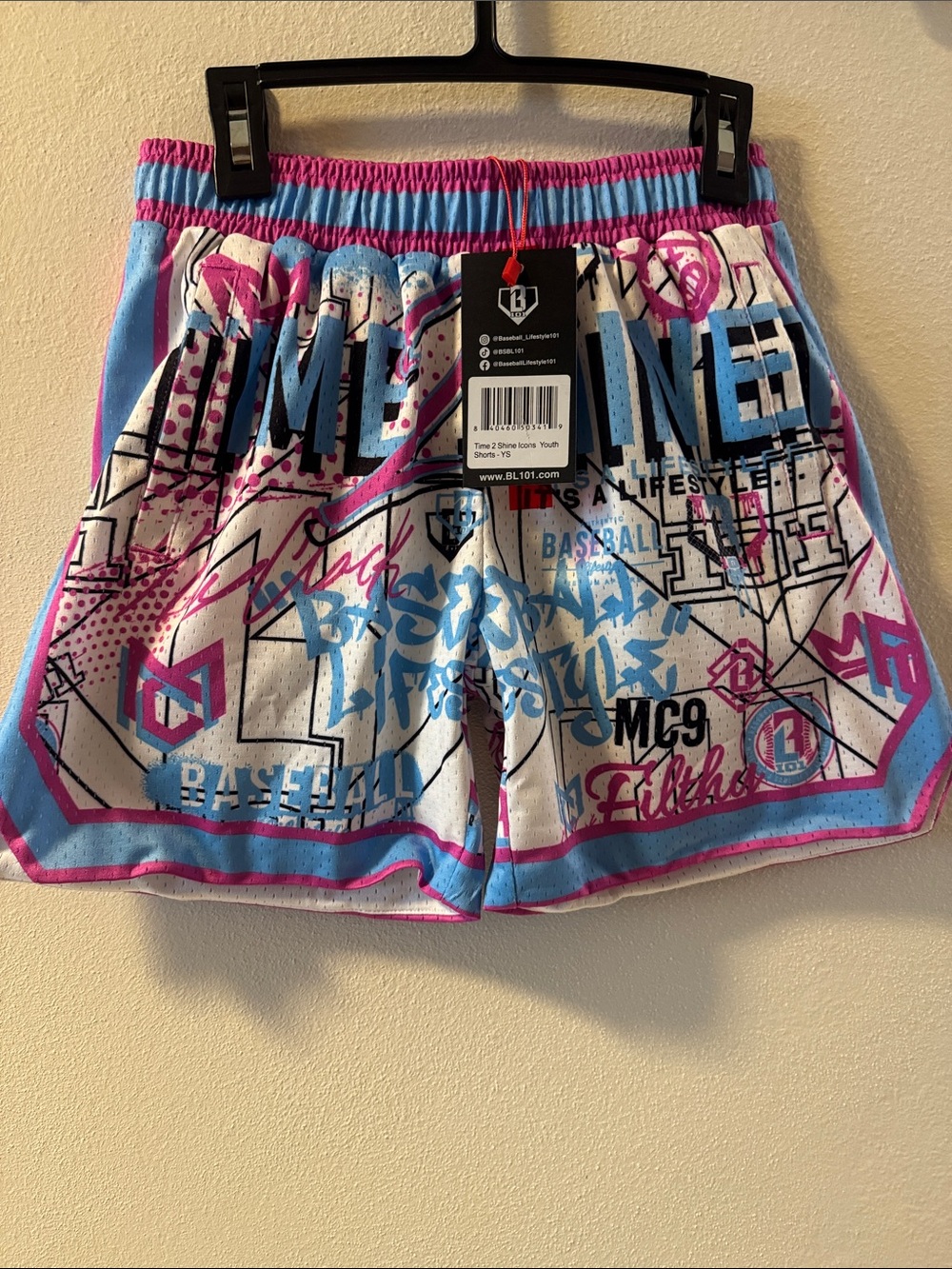 Boys White Graphic Athletic Shorts with Pink & Blue Trim by BL101